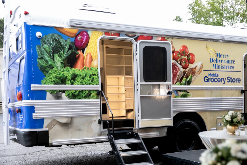 Side door of the Mercy Deliverance Ministries Mobile Grocery Store bus open